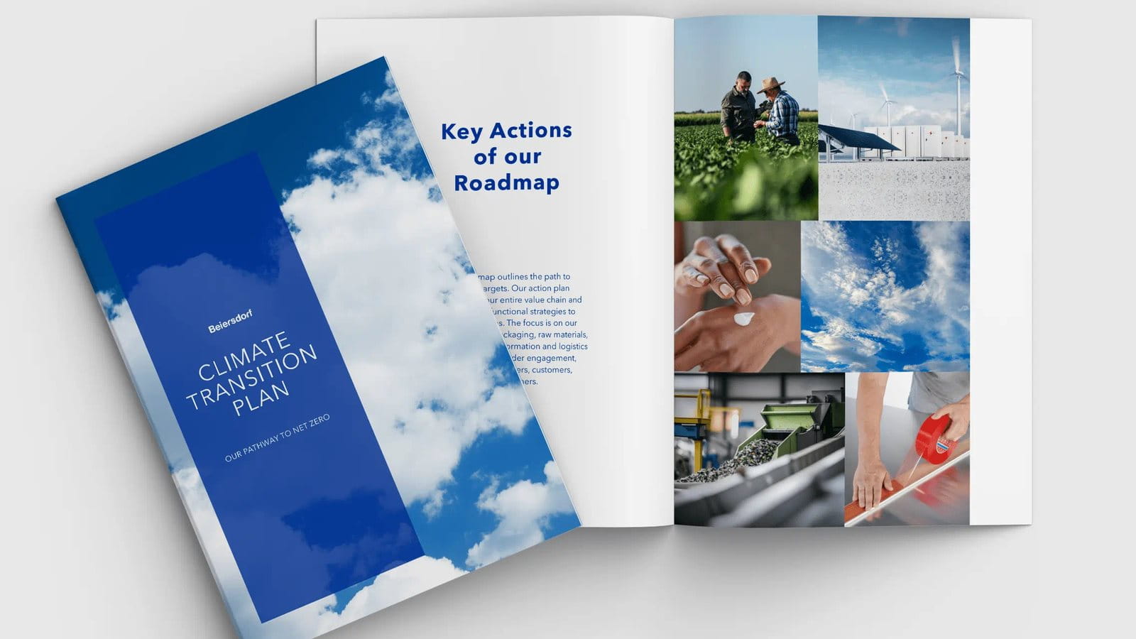 Open book with the title climate transition plan on grey background.